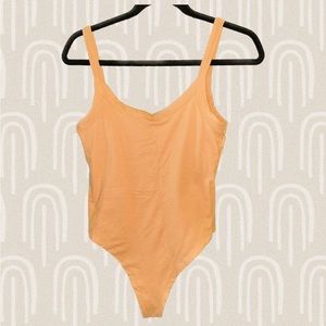 Cotton On orange bodysuit